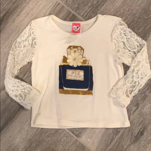 Mini mini 2pcs lace sleeve long sleeve top & tutu. - Picture 4 of 5